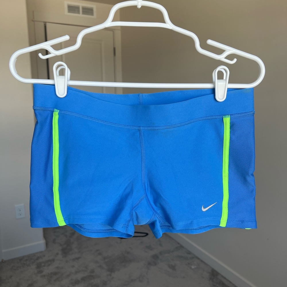Nike spandex shorts (thicker material than spandex) but tighter than shorts